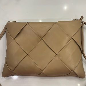 Woven Clutch
By Anthropologie